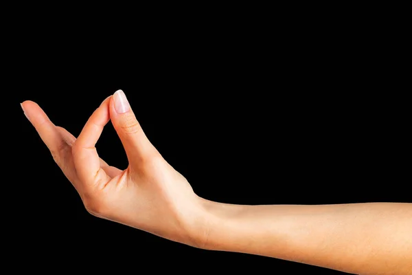 Woman hand holding something with two fingers — Stock Photo, Image