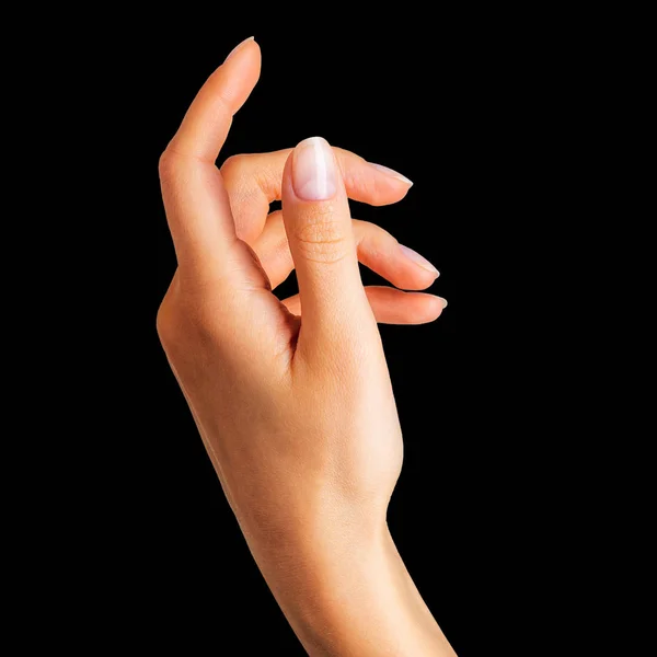 Woman hand holding something with two fingers