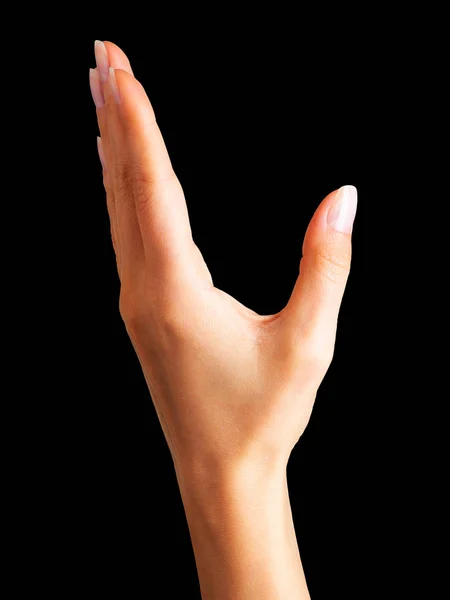 Рука жінки, що показує підбирання позу або тримання — стокове фото