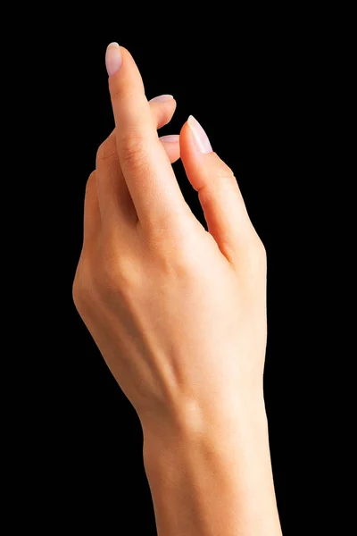 Woman hand holding something with two fingers — Stock Photo, Image