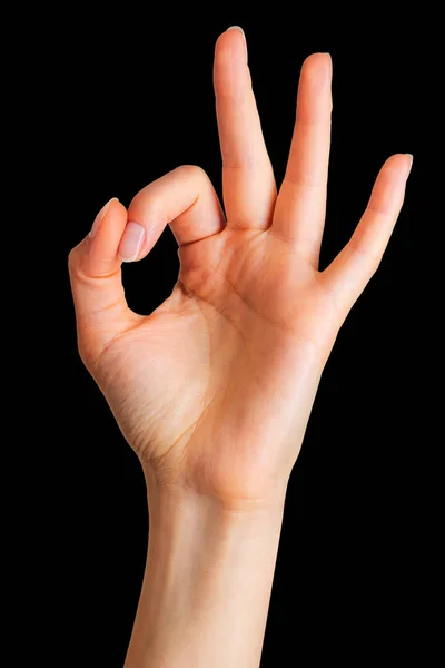 Mano de mujer mostrando gesto mudra o sosteniendo algo . — Foto de Stock