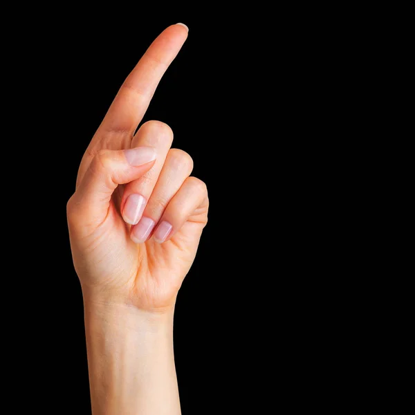 Mano de mujer con el dedo índice hacia arriba — Foto de Stock