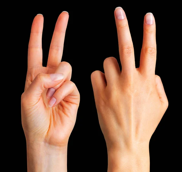Mano femenina mostrando dos dedos en el símbolo de la paz — Foto de Stock