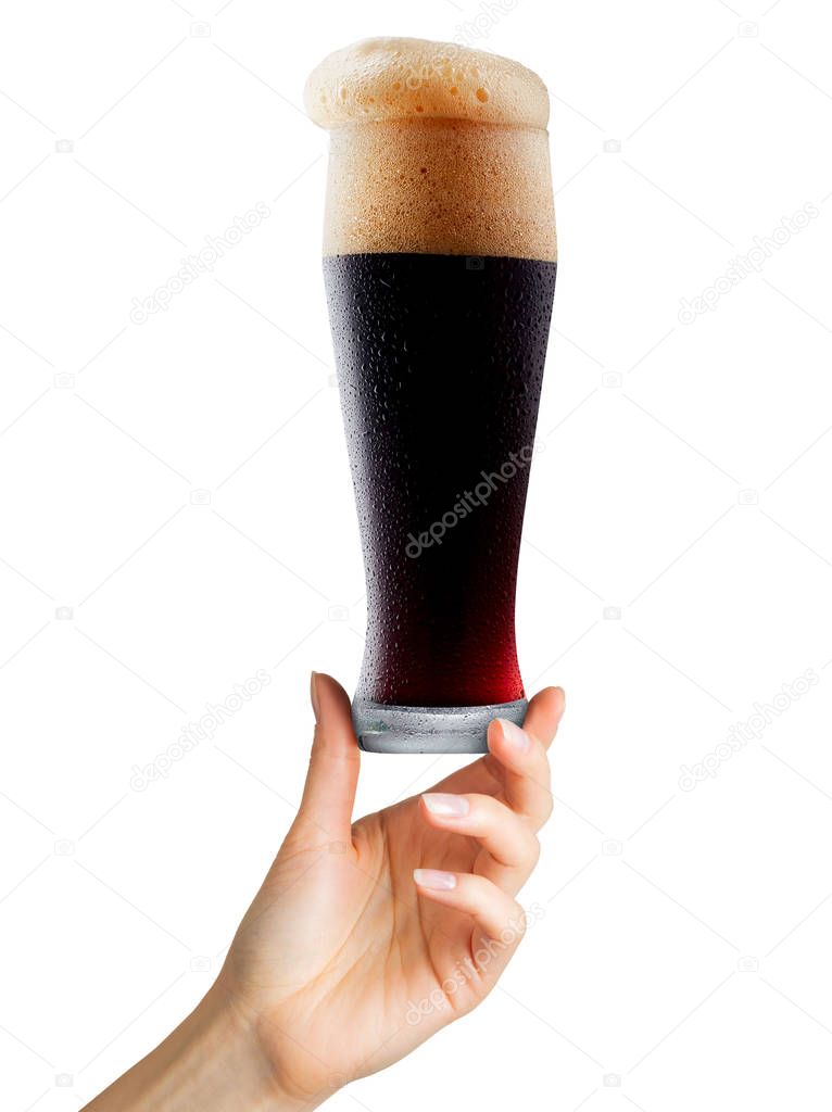 Woman hand holding mug of beer with foam on white background