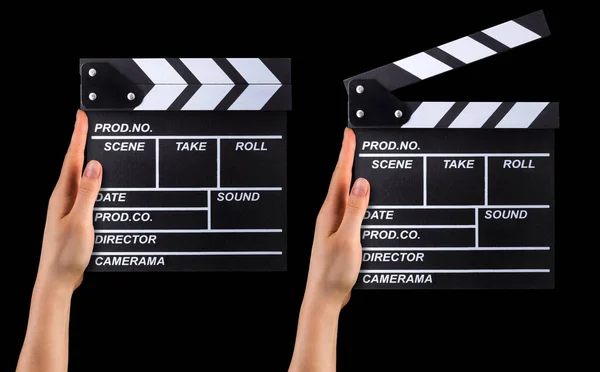 Set van film clapper boards en menselijke handen geïsoleerd op zwarte achtergrond — Stockfoto