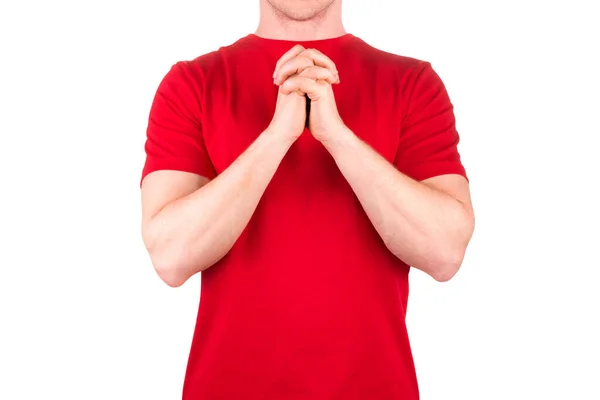 Чоловік у червоній сорочці молиться Богу і просить прощення або диво ізольовано — стокове фото