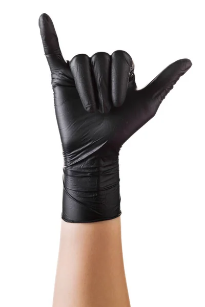 Hand in zwarte handschoenen met Shaka of surfer teken op wit — Stockfoto