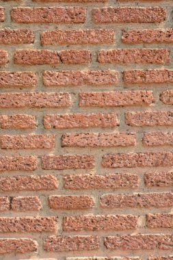Kırmızı tuğla duvar güzel dokulu bir arka plan olarak