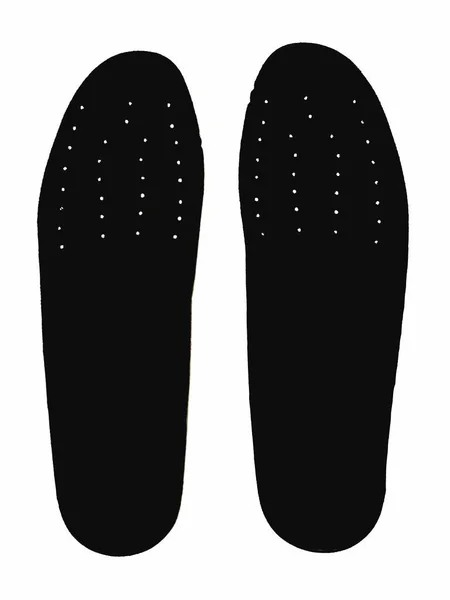 Black insoles for shoes on white background. — Stock Photo, Image