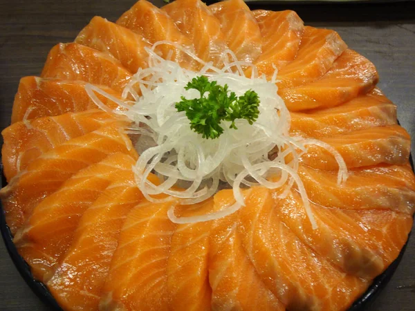 Salmon Raw Sashimi Black Japanese Traditional Dish Wood Table Stock Image