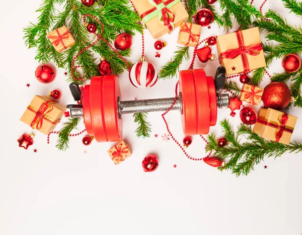 Mancuerna Roja Con Decoraciones Navideñas Sobre Fondo Blanco —  Fotos de Stock