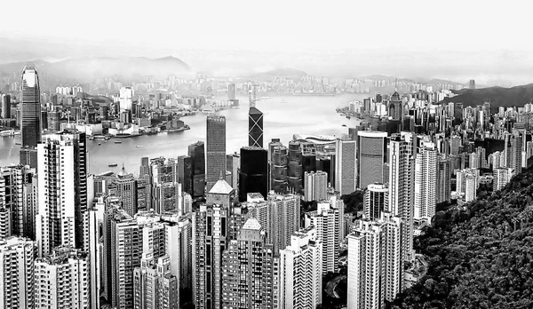 Aerial view of futuristic skyscrapers of Hong Kong island from the top of Victoria peak. Urban skyline. Black and white colors
