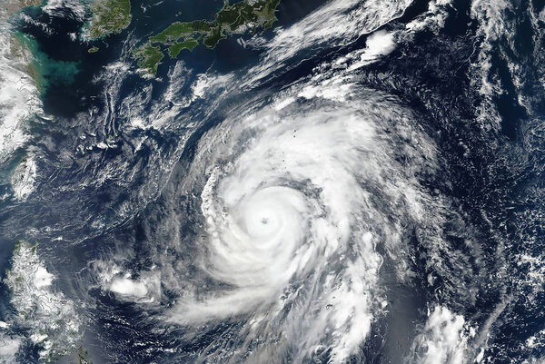 Hagibis super typhoon approaching the coast. The eye of the hurricane. Satellite view.  Some elements of this image furnished by NASA