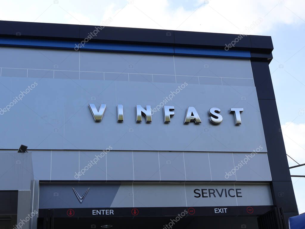 Balikpapan-indonesia september 13, 2025 VinFast logo sign on modern building wall with blue sky background