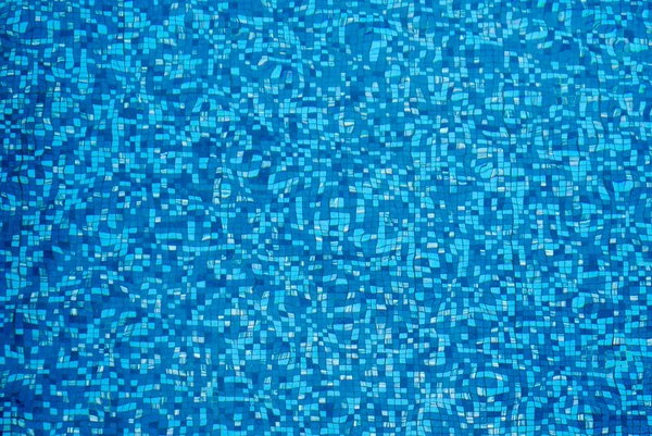 蓝色波纹表面水的游泳池的抽象背景 — 图库照片