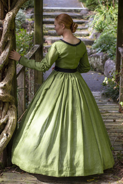 Victorian woman in green dress