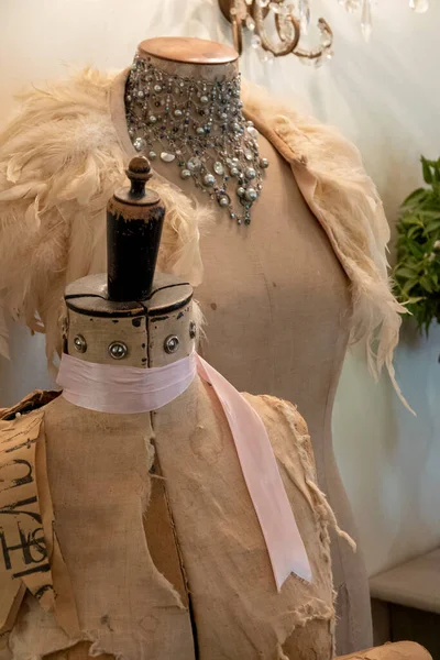 Vintage mannequins with jewels and ribbons