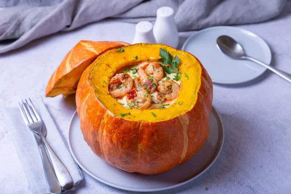 Pumpkin stuffed with shrimps and cheese, whole baked. Traditional Brazilian dish. Close-up. — Stock Image Pumpkin Stuffed Shrimps Cheese Whole Baked Traditional Brazilian Dish Close Stock Image