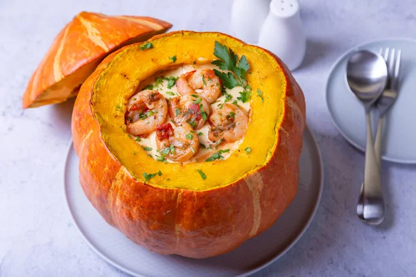 Pumpkin stuffed with shrimps and cheese, whole baked. Traditional Brazilian dish. Close-up. — Stock Image Pumpkin Stuffed Shrimps Cheese Whole Baked Traditional Brazilian Dish Close Royalty Free Stock Photos