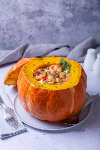 Pumpkin stuffed with shrimps and cheese, whole baked. Traditional Brazilian dish. Close-up. — Stock Image Pumpkin Stuffed Shrimps Cheese Whole Baked Traditional Brazilian Dish Close Stock Picture