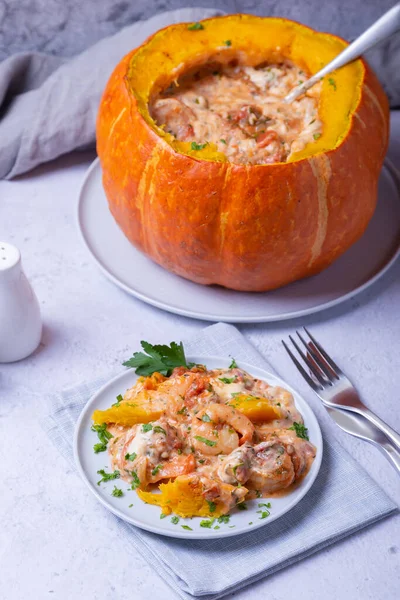 Pumpkin stuffed with shrimps and cheese, whole baked. Traditional Brazilian dish. Close-up. — Stock Image Pumpkin Stuffed Shrimps Cheese Whole Baked Traditional Brazilian Dish Close Royalty Free Stock Images