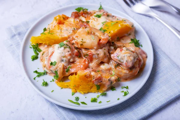 Pumpkin with shrimps and cheese. Traditional Brazilian dish. Close-up. — Stock Image Pumpkin Shrimps Cheese Traditional Brazilian Dish Close Royalty Free Stock Photos