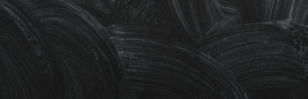 Background and texture of black school chalkboard with dried white chalk. Panorama. Banner.