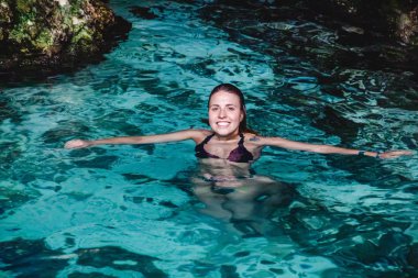 Photo of Girl at Hoyo Azul in Punta Cana, Dominican Republic clipart