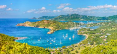 English harbour and Nelsons Dockyard in Antigua and Barbuda, paradise island of antigua in the caribbean at the viewpoint of Shirley Heights and Freeman's bay clipart