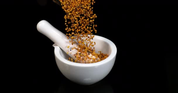 Pollen Dumplings Falling Black Background Mortar Pestle Slow Motion — Stock Video