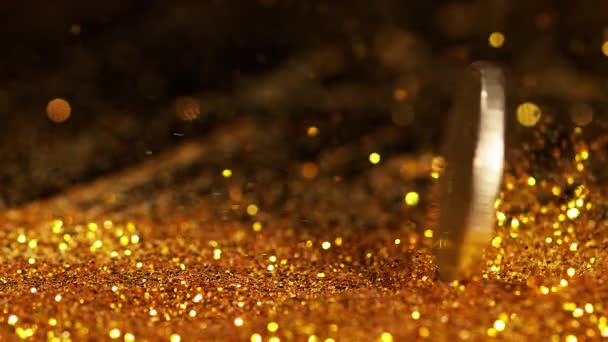 Gouden Glitter Plons Donkere Ondergrond — Stockvideo