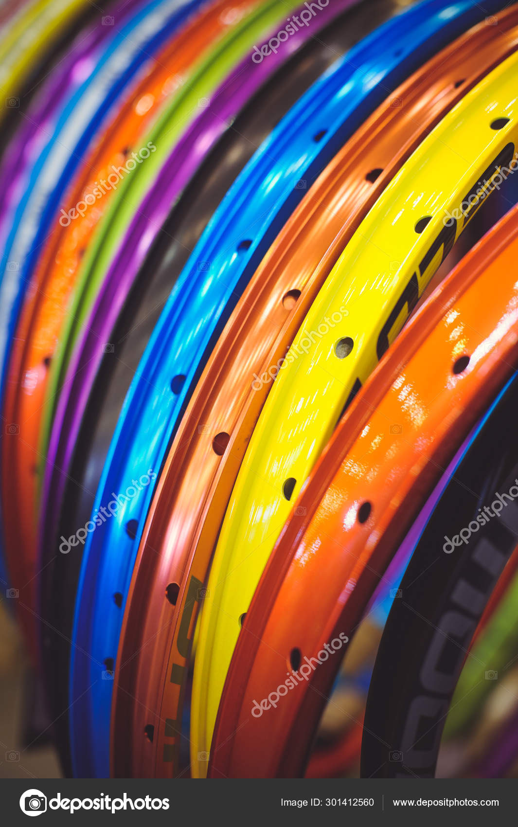 Sale beautiful colored bicycle rim stand in a row of different colors