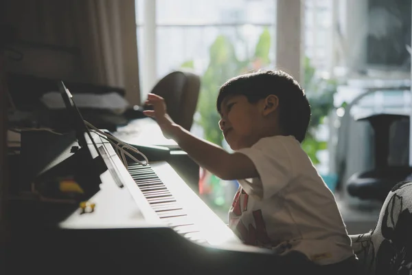 Little Boy Playing Piano Music Tablet Home — Stock Photo, Image
