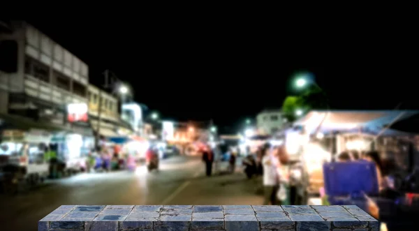 Exhibición Vacía Estantería Piedra Con Fondo Del Mercado Nocturno — Foto de Stock