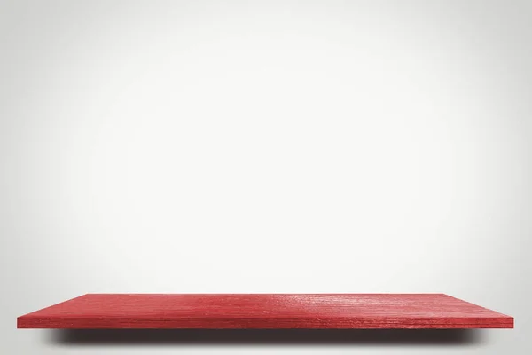 Красное дерево на белой полке дисплея продукта — стоковое фото