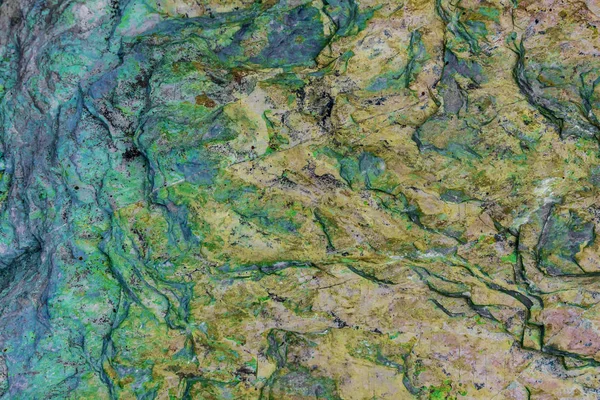 Verde y rojo Geología de la textura colorida de roca para la textura y la espalda — Foto de Stock