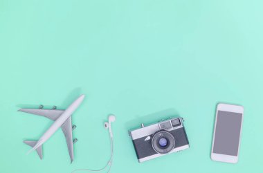 Seyahat aksesuarları nesneleri ve gadget'lar üst görünüm flatlay mavi 