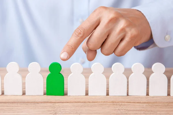 Choosing a good leader worker from the crowd of bad. HR. Man in  shirt points  finger at good worker — Stock Photo, Image