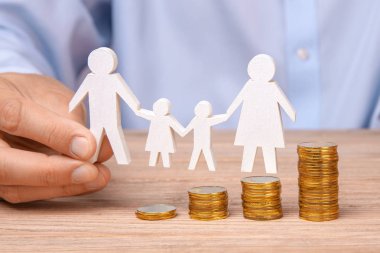 Bütçe aile. Sikke yığını ve aile sembolü 