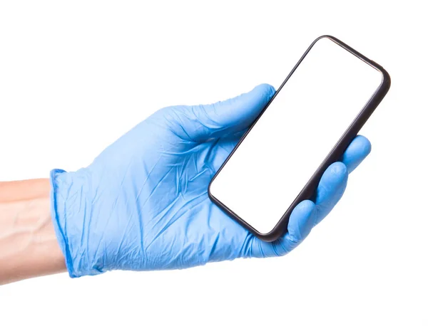 O Doutor de luva azul está a segurar o telemóvel com ecrã táctil nas mãos. Isolado em branco — Fotografia de Stock