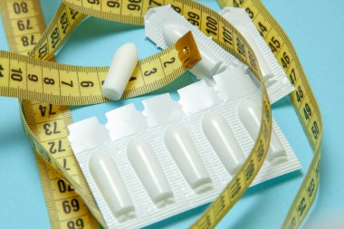 Anal ve vajinal kullanımı ve sarı bant ölçme için fitil. Obezite, kilo, kilo kaybı tedavisi için mumlar.