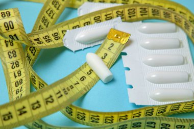 Anal ve vajinal kullanımı ve sarı bant ölçme için fitil. Obezite, kilo kaybı için ekstra ağırlık tedavisi için mumlar