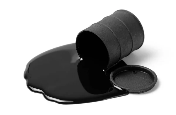 Oil spilled from black barrel isolated on white background — Stock Photo, Image