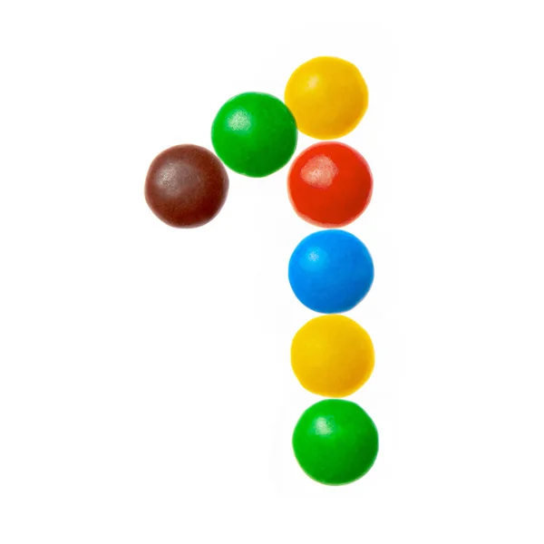 Bir tatlı şekerler, renkli 1 numaralı beyaz arka plan üzerinde izole alfabesi — Stok fotoğraf