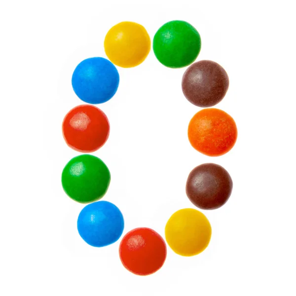 Sayı 0 sıfır hoş renkli şekerler, beyaz arka plan üzerinde izole alfabesi — Stok fotoğraf