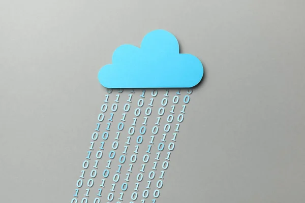 Cloud storage. Personal and business information is stored online in the cloud. Blue cloud and binary code in the form of rain