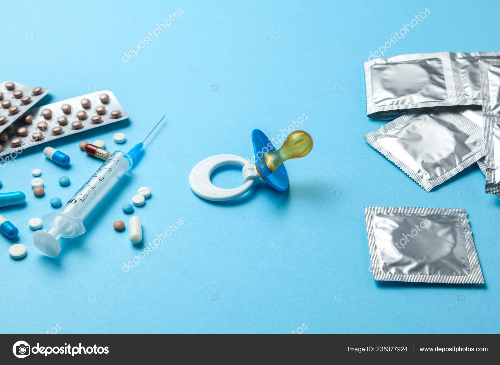 birth-control-pills-an-injection-syringe-and-condom-in-a-package-on