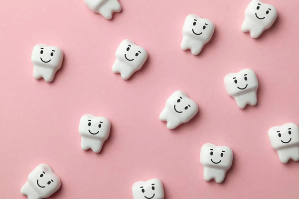 Healthy white teeth are smiling on pink background