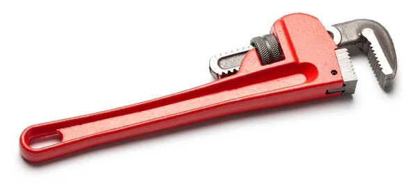 Metalowy klucz regulowany z czerwonym uchwytem na białym tle. — Zdjęcie stockowe