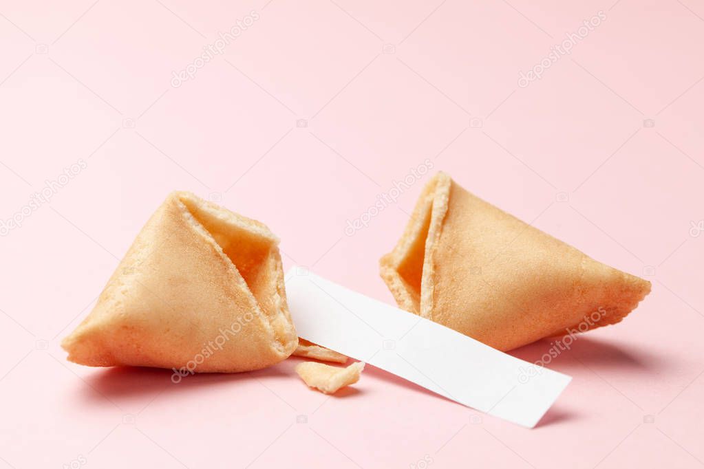 Chinese fortune cookies. Cookies with empty blank inside for prediction words. Pink background Copy space for text.